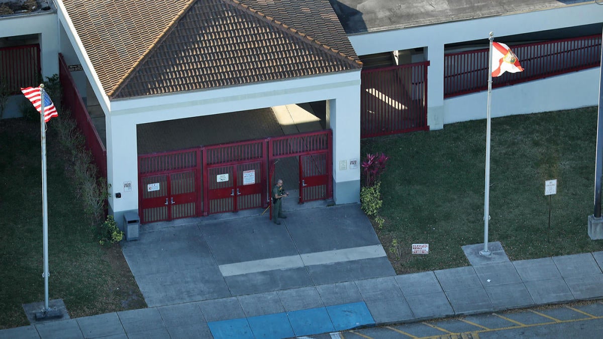 Florida school shooting: Hero football coach dies shielding students at ...