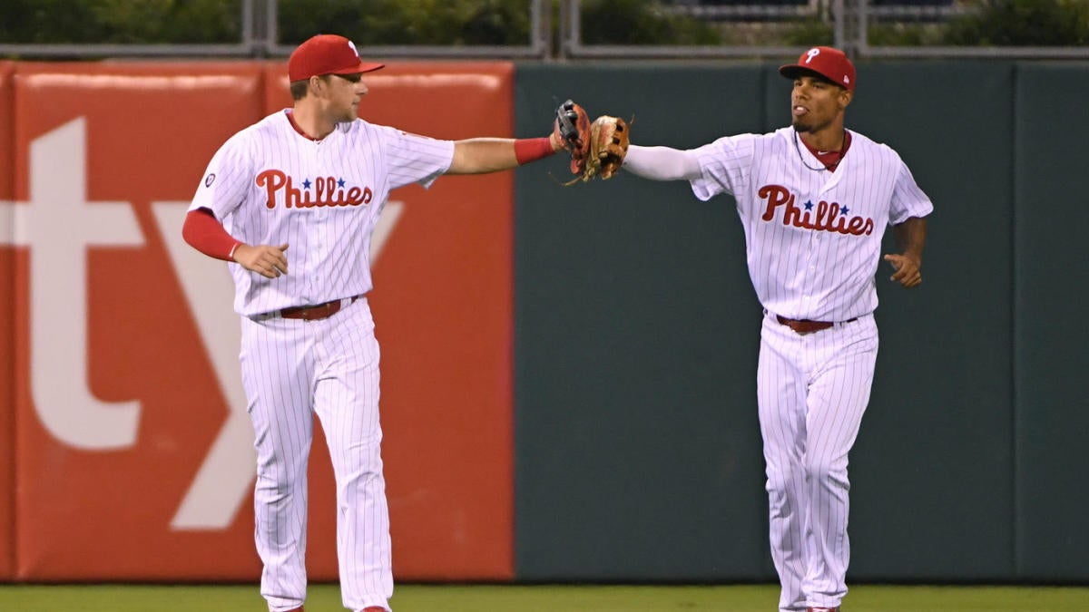 From left, Philadelphia Phillies' Rhys Hoskins, Odubel Herrera and