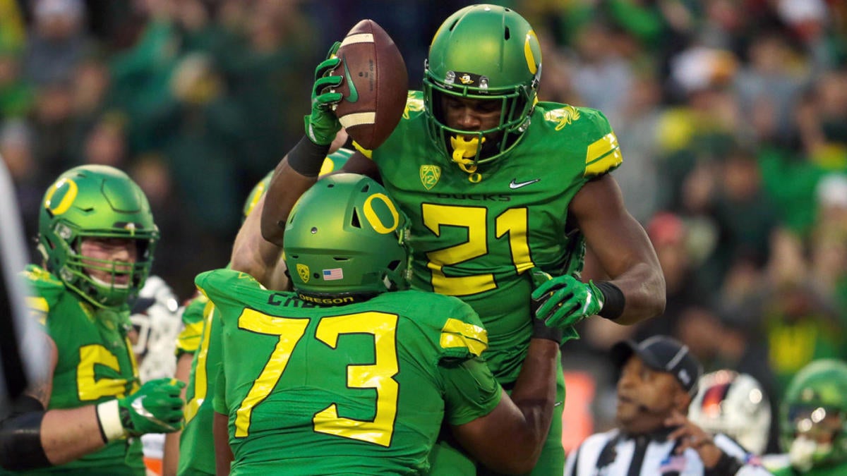 Denver Broncos may call on former Oregon Duck Royce Freeman to play at  quarterback today 