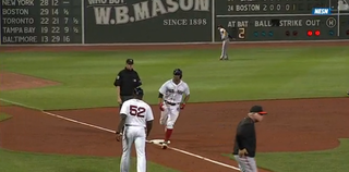 Orioles manager Buck Showalter tries to change pitchers during HR trot