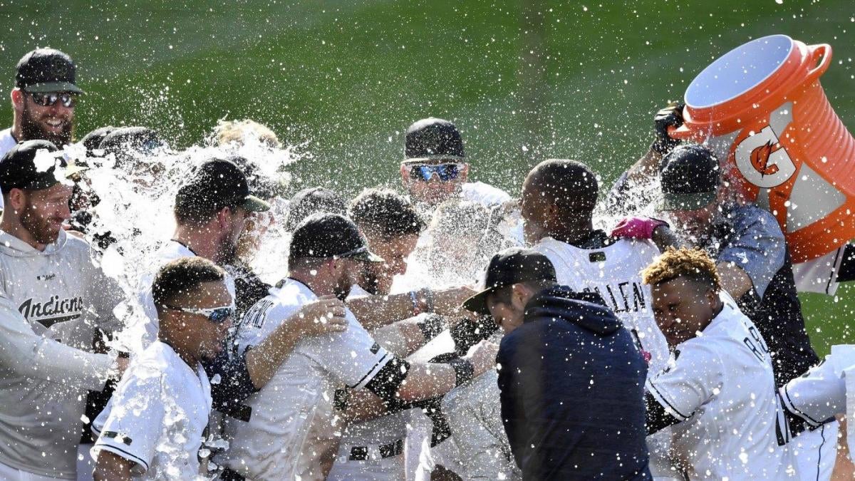 Ramirez leads Marlins to wet win over Nationals