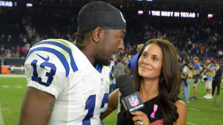 CBS sideline sports broadcaster Tracy Wolfson, right, interviews