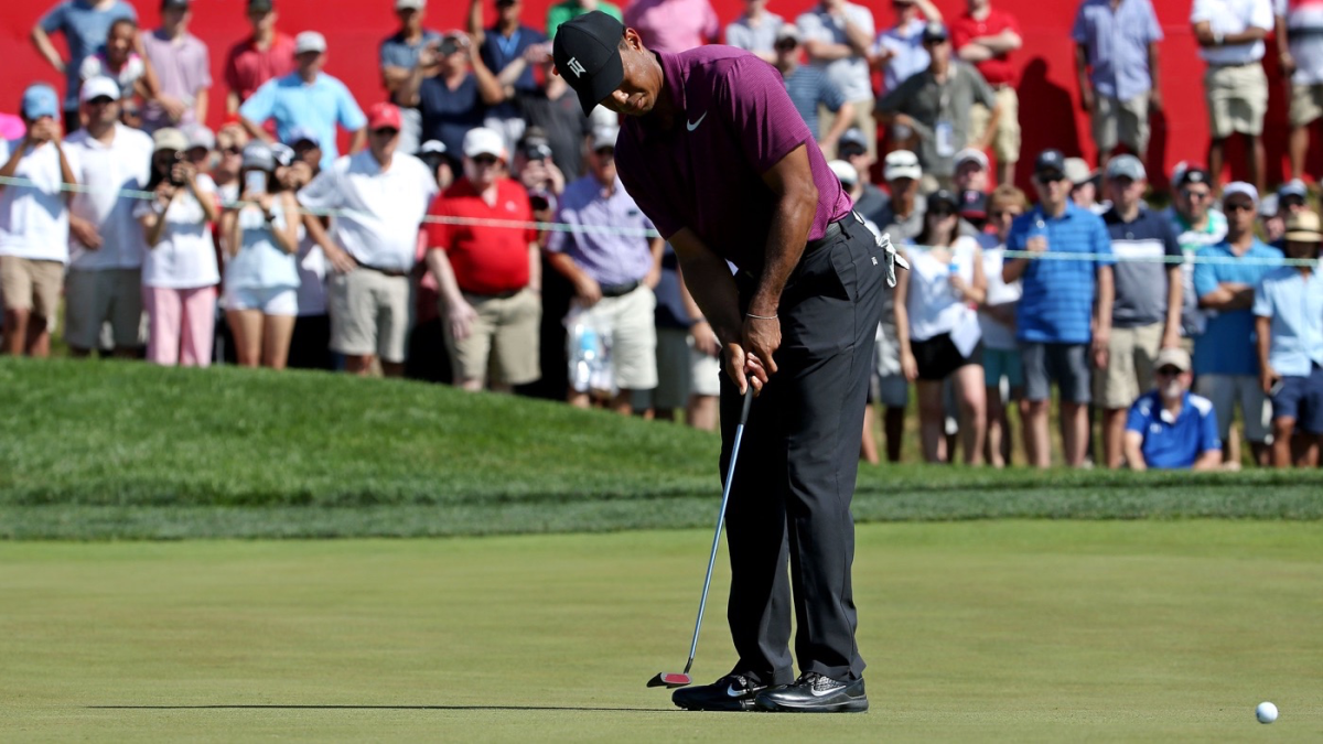 Tiger Woods score: Puts new putter to good use, soars up Quicken Loans ...