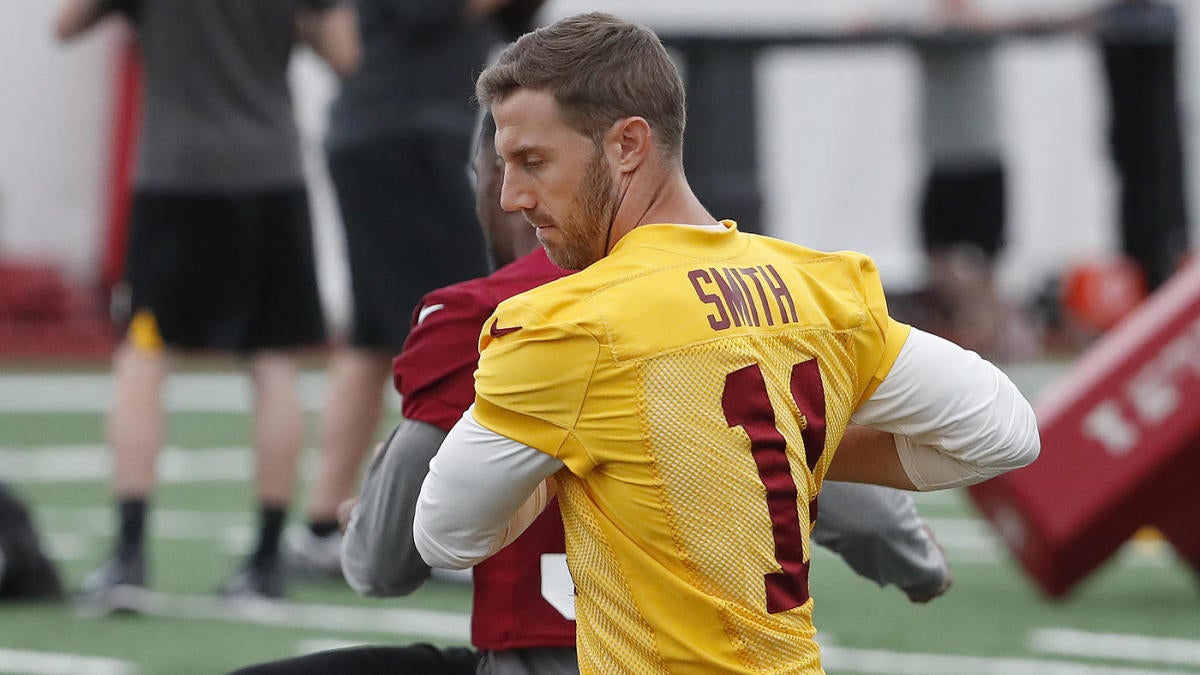 Alex Smith works out with Dwayne Haskins at Redskins practice a year after brutal leg injury