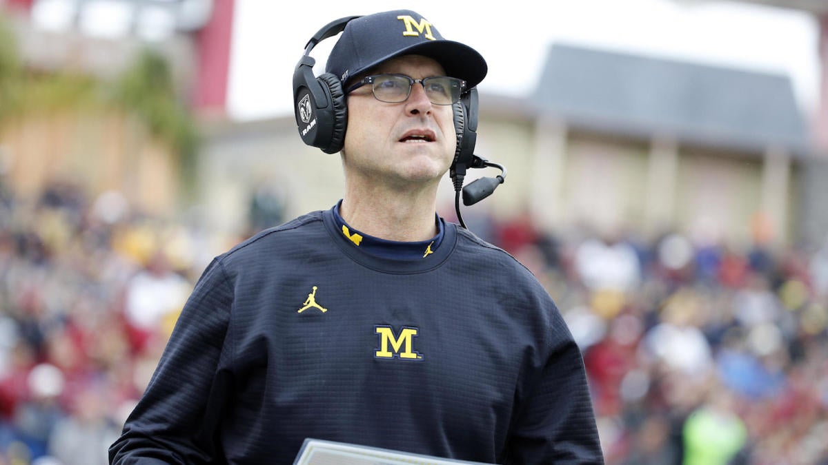 Vikings interviewing Michigan coach Jim Harbaugh for coaching vacancy on National Signing Day, per report
