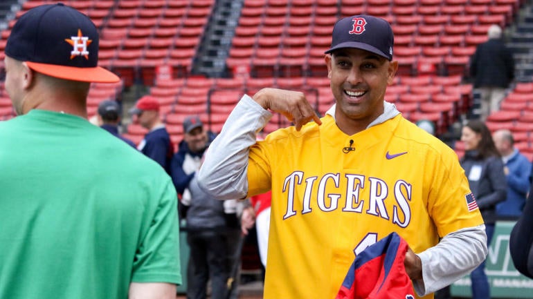 Red Sox manager Alex Cora wears LSU baseball jersey after losing college footbal...