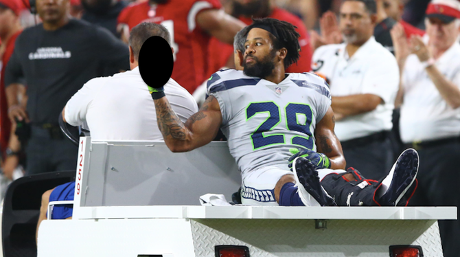 earl-thomas-pete-carroll-middle-finger.png