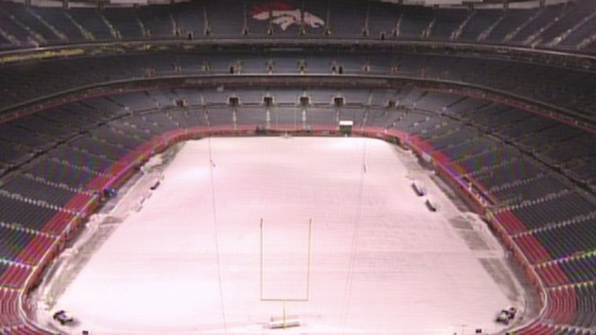 Snow covers the playing field at Arrowhead Stadium before an NFL