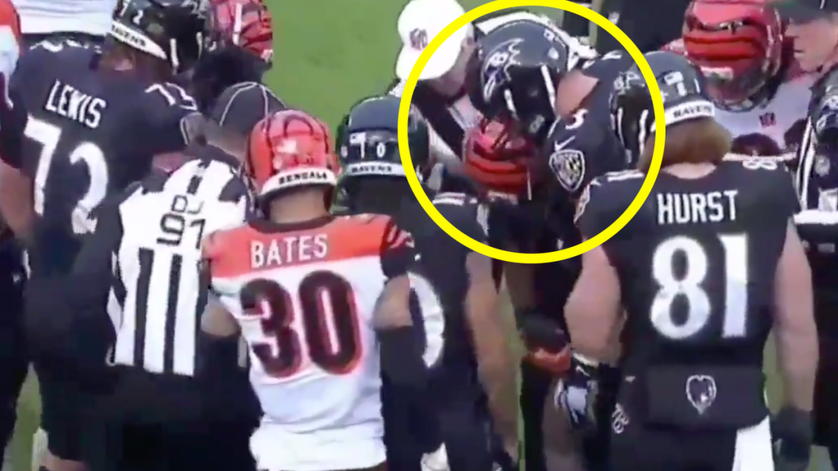 Baltimore Ravens' Marshal Yanda spits at Bengals' Vontaze Burfict