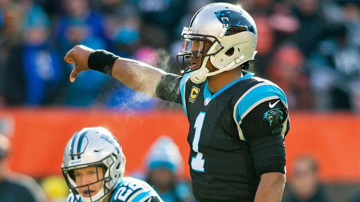 Panthers quarterback Cam Newton throws a pass down filed