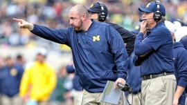 Ex-Michigan coach's lawsuit alleges school leaders covered up sign-stealing scheme ahead of 2023 title season