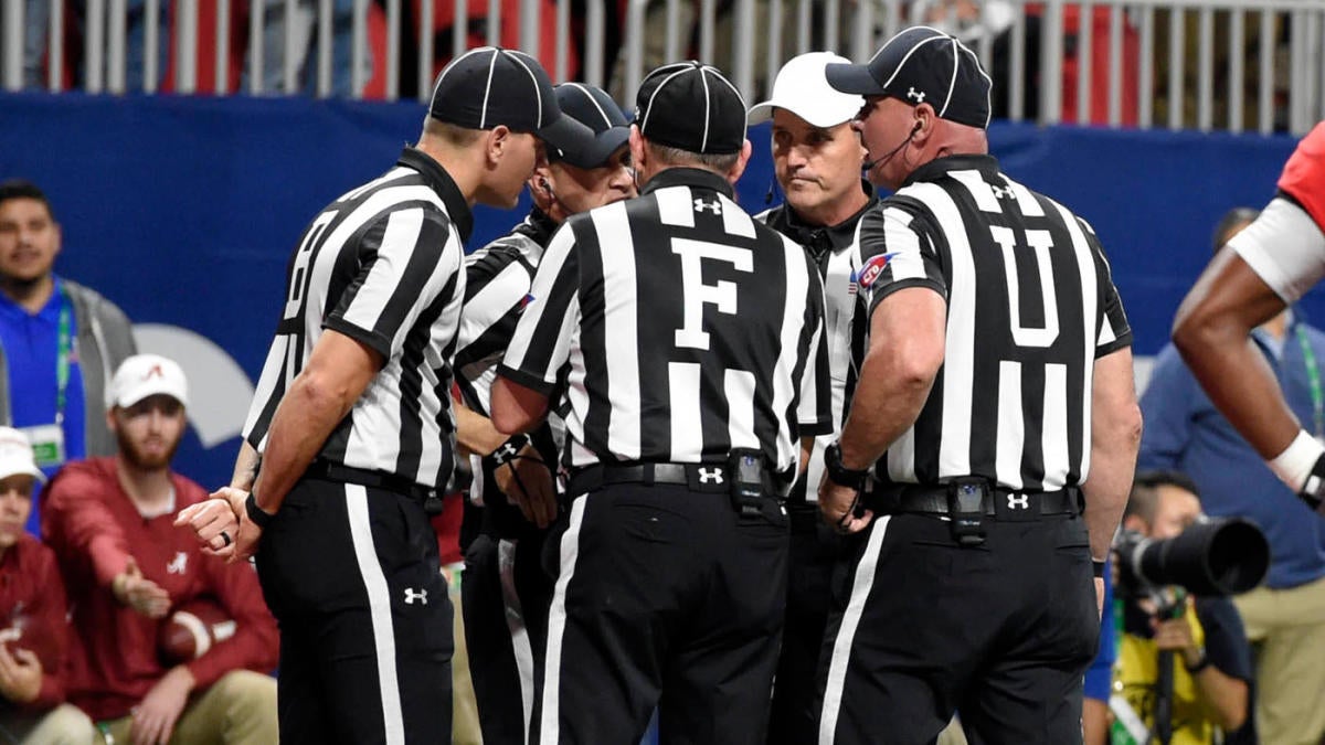 Conferences have been replacing about two college football officials per week amid COVID-19 issues