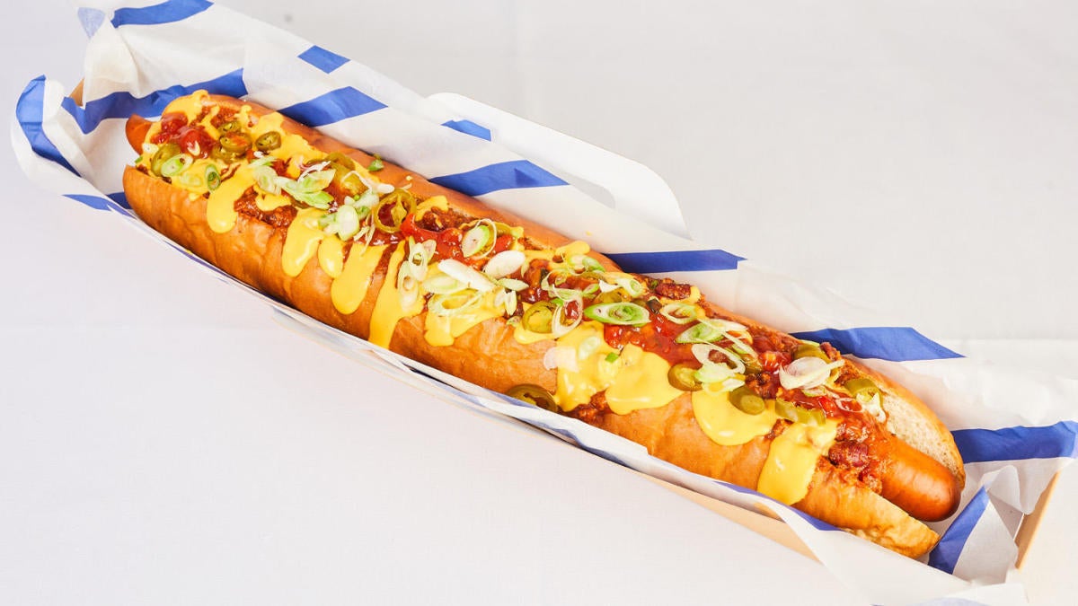 talkSPORT host eats two-foot hot dog that will be sold at West Ham's London  Stadium this summer as baseball returns in MLB London Series