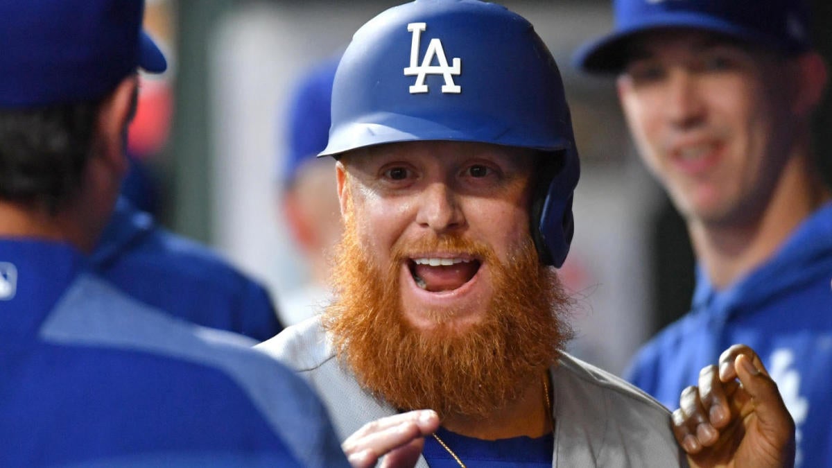 Los Angeles Dodgers' Justin Turner (21) stands at first base during the  second inning of a baseball game Wednesday, Sept. 15, 2021, in Los Angeles.  Turner wore jersey number 21 in honor