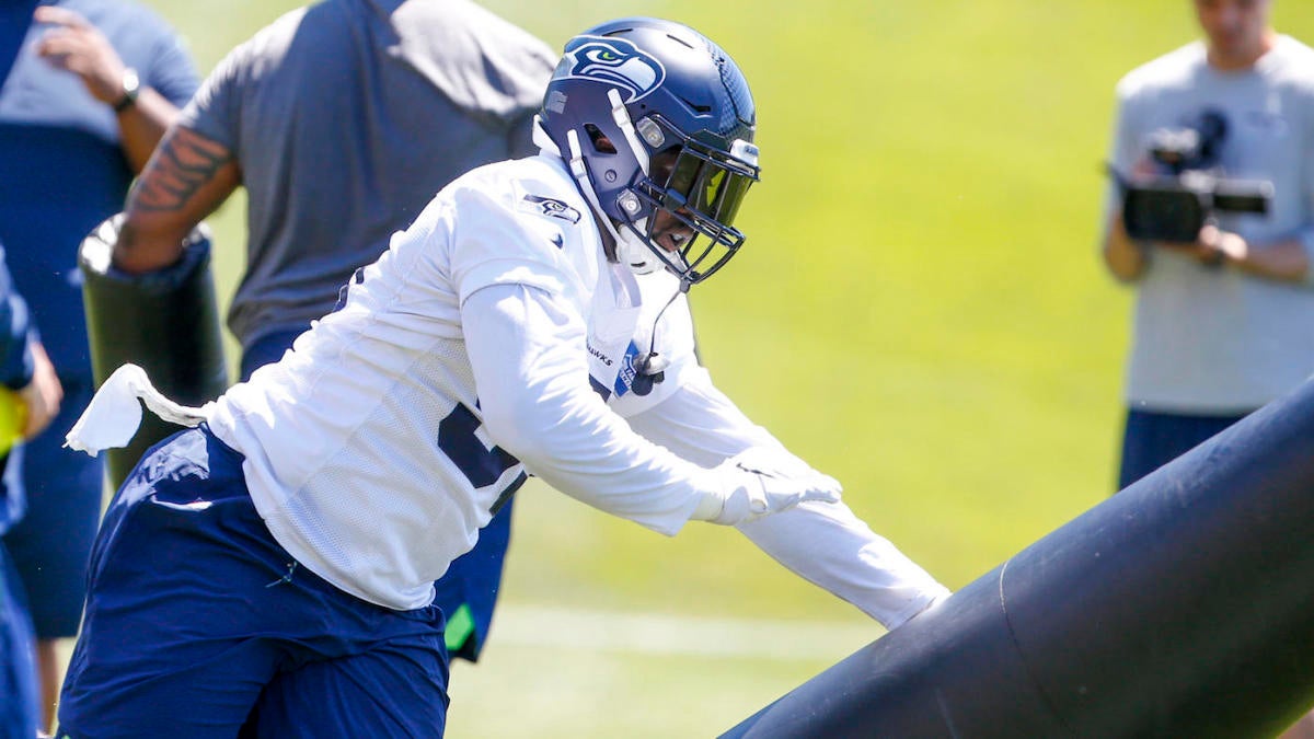 Seattle Seahawks' L.J. Collier walks off the field after an NFL