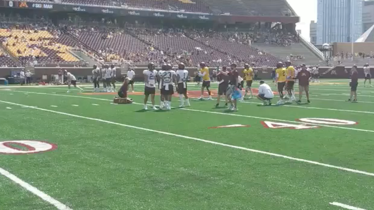 Gopher Football quarterbacks work in drills on August 3rd