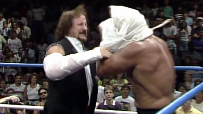 Terry Funk tries to suffocate Ric Flair with a plastic bag.