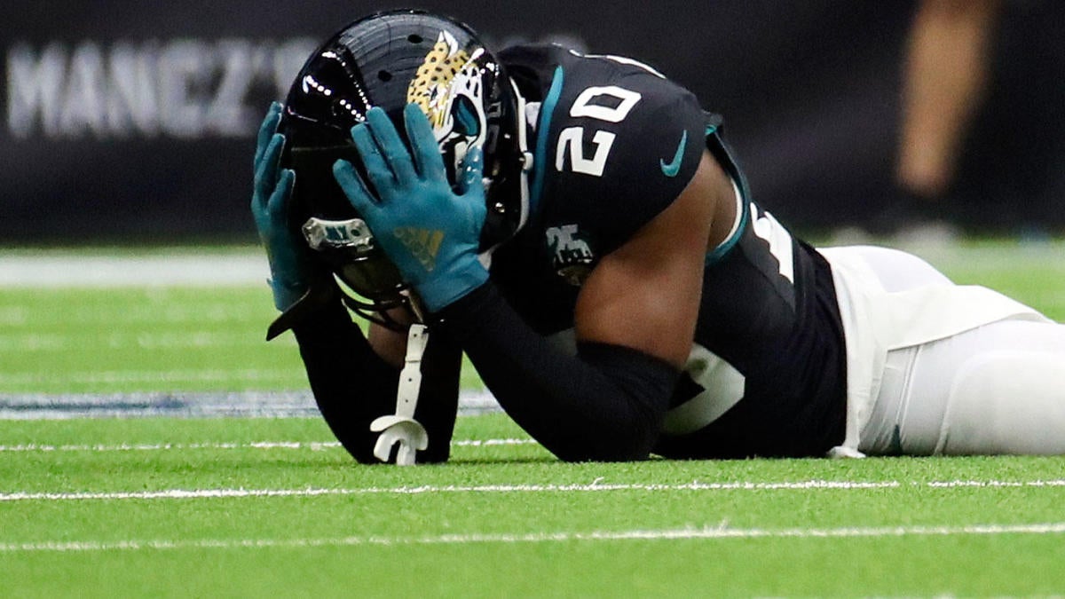 Los Angeles Rams cornerback Jalen Ramsey (5) grabs the jersey of Carolina  Panthers quarterback PJ Walker (11) for a sack during an NFL football game  Sunday, Oct. 16, 2022, in Inglewood, Calif. (