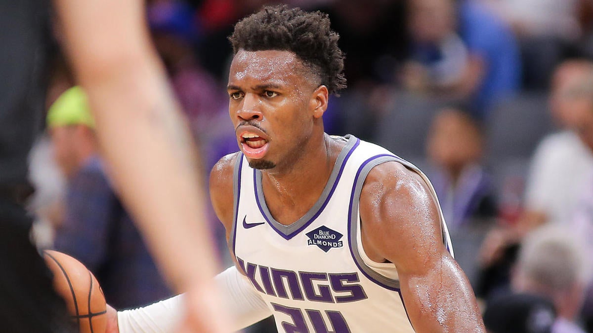 Buddy Hield makes money sign at Kings GM during team's fan fest as two ...