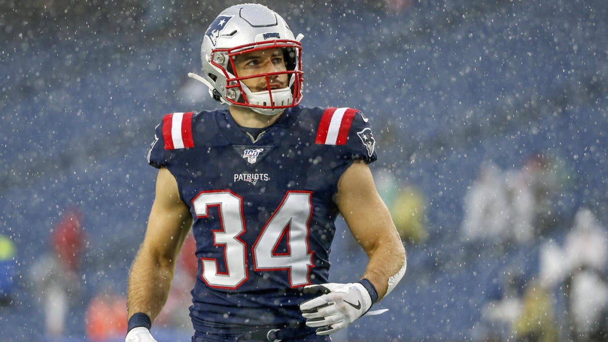 Houston Texans running back Rex Burkhead (28) warms up before an