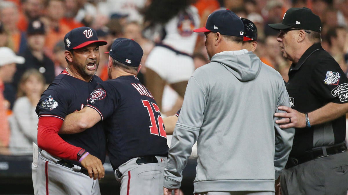 Washington Nationals manager Dave Martinez walks back to the dugout after a  pitching change during a baseball game against the Atlanta Braves early  Saturday, Aug. 14, 2021, in Washington. (AP Photo/Nick Wass