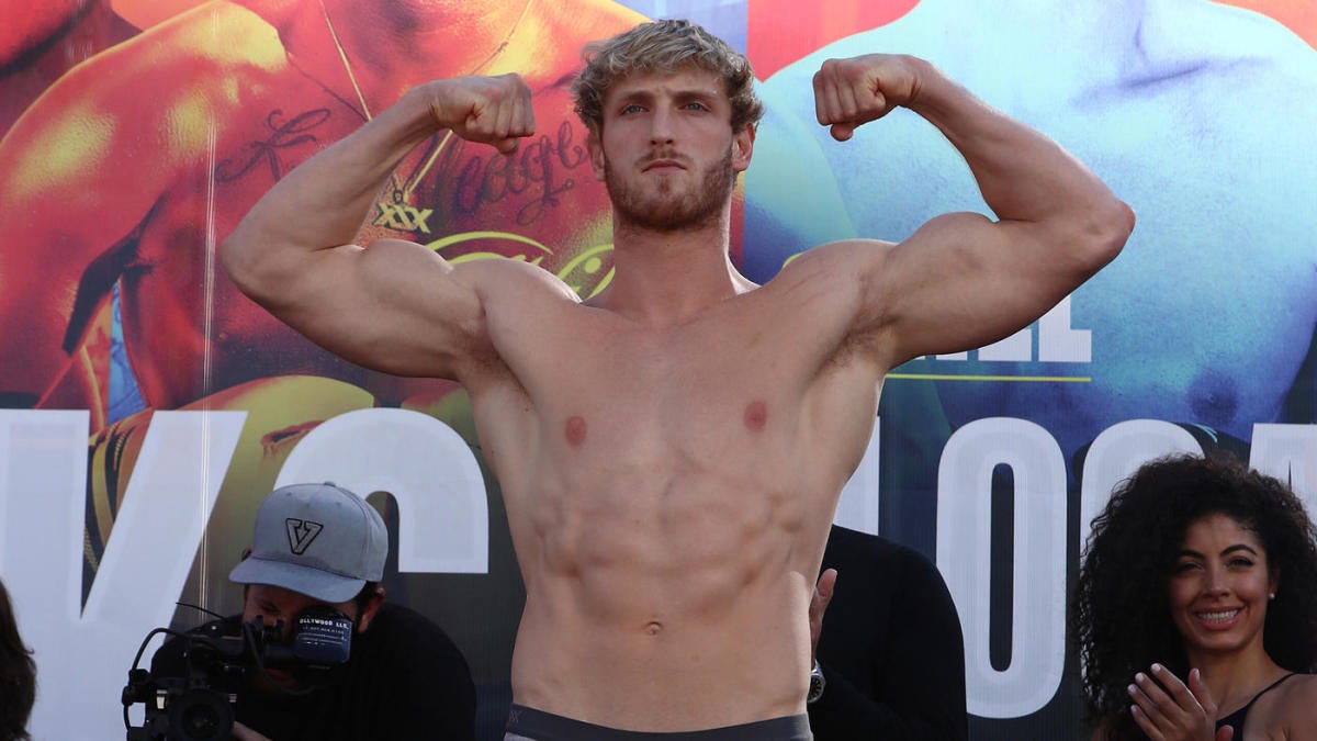 Logan Paul Flexing his Biceps with his Shirt Off
