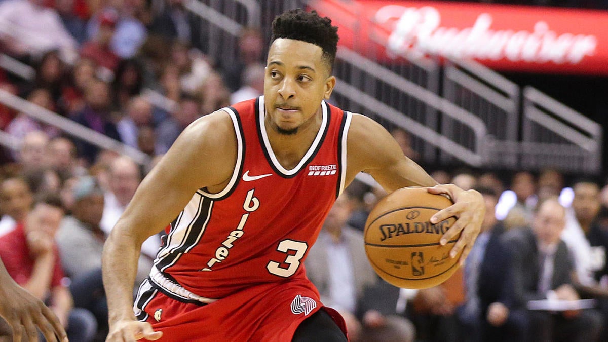 Blazers' C.J. McCollum has played last three games with fracture in lower back, per report - CBSSports.com