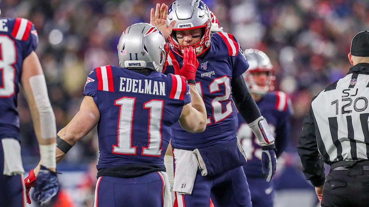 New England Patriots wide receiver Julian Edelman makes a diving