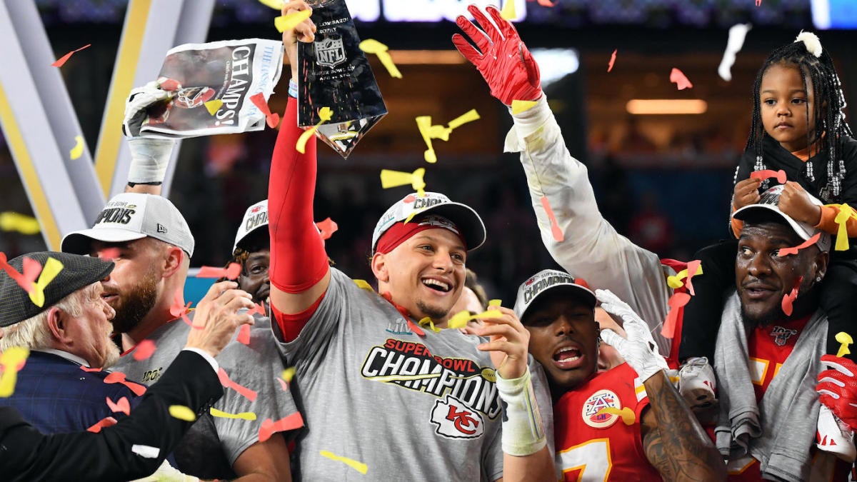 Kansas City Chiefs quarterback Patrick Mahomes holds up the Lombardi trophy  before a baseball game between the Kansas City Royals and the Cincinnati  Reds Monday, June 12, 2023, in Kansas City, Mo.