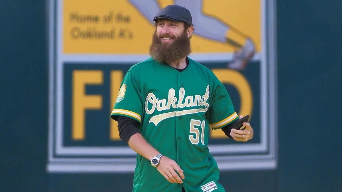 Former Oakland Athletics pitcher Dallas Braden wears a jersey of