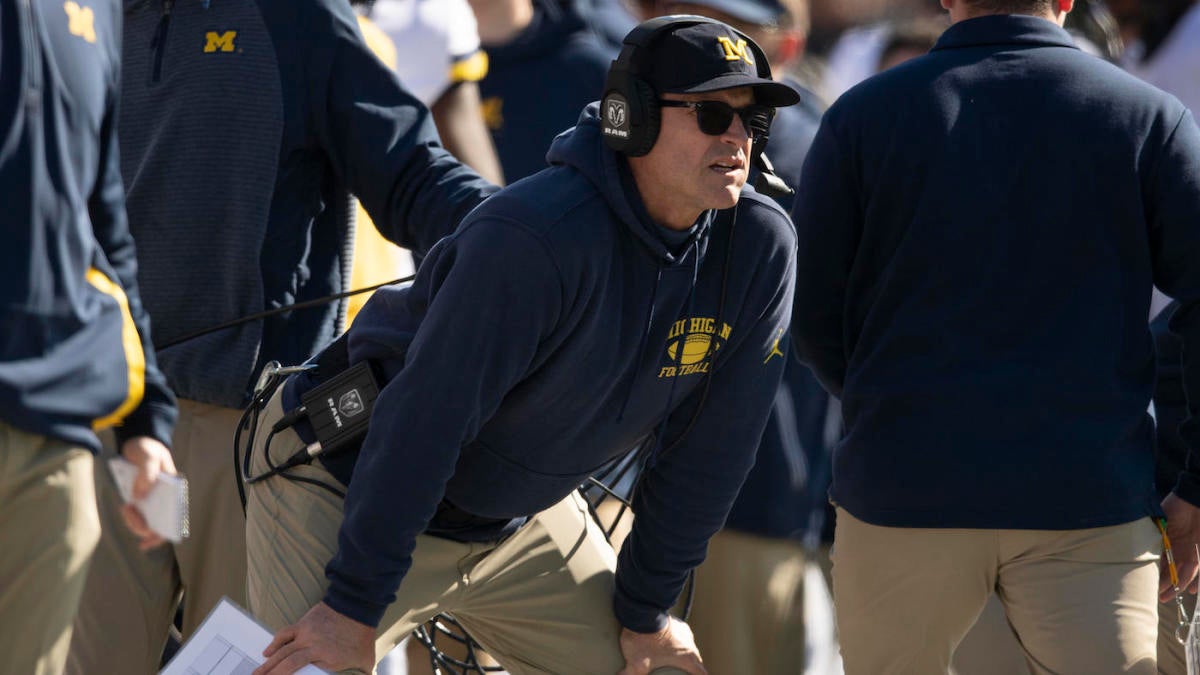 Michigan Coach Jim Harbaugh Walks With Players, Parents To Protest Big ...