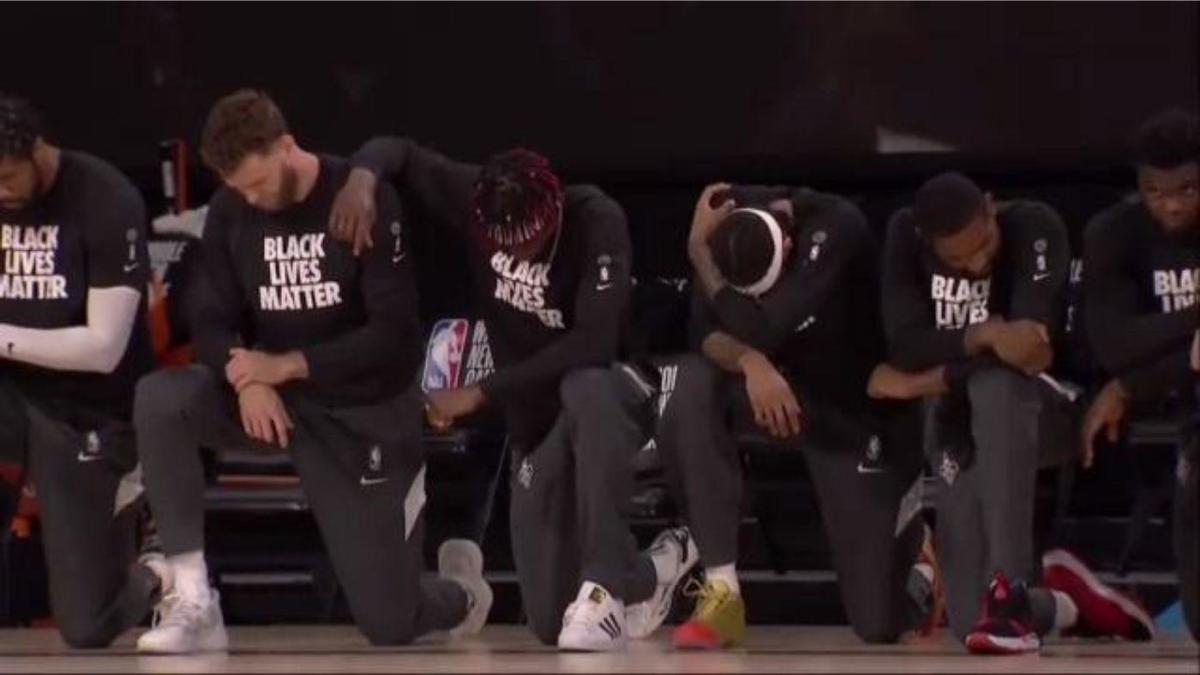 Adam Silver responds to NBA players kneeling during anthem before first game in Disney bubble