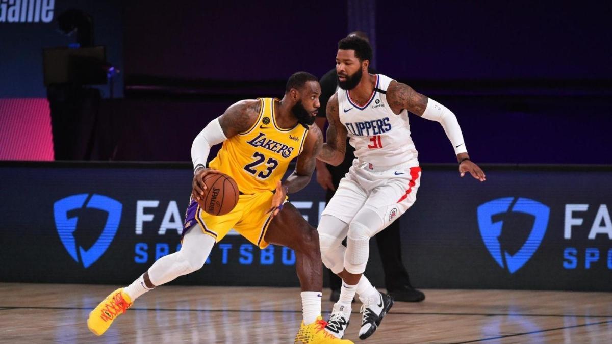 Lakers take down Clippers in crunch time to come away with a win in their first game of NBA's Orlando restart - CBSSports.com