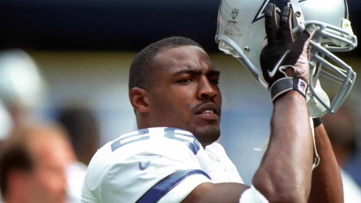 Defensive back Darren Woodson of the Dallas Cowboys looks on