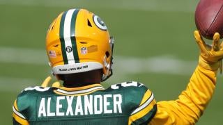 12/9/2018 Jaire Alexander talks to a Packer fan.