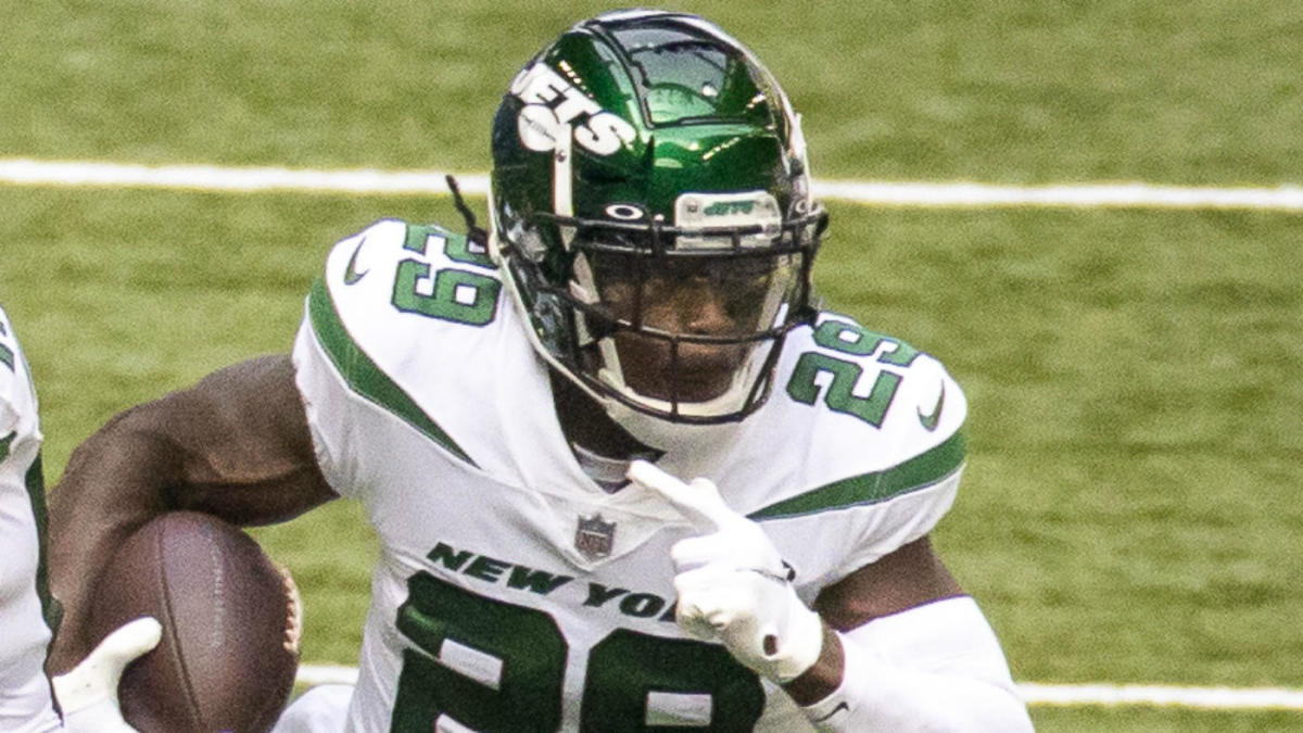 New York Jets Laveranues Coles jumps in the arms of teammates