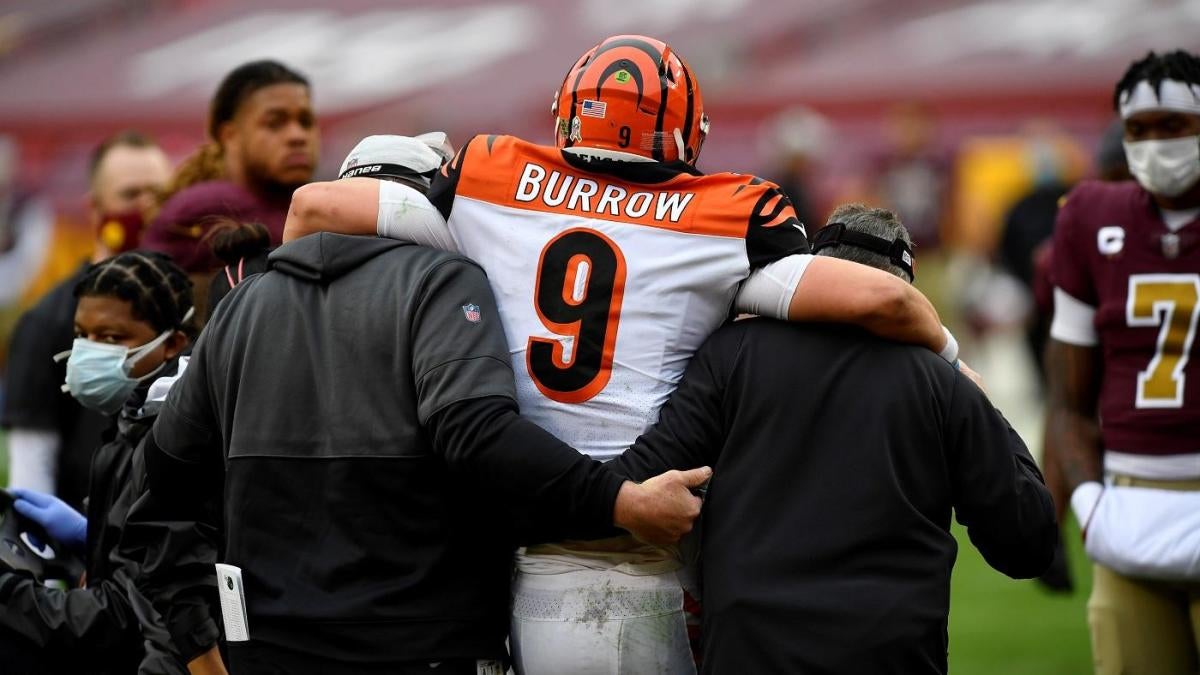 Top pick Burrow injures left knee, Washington beats Bengals