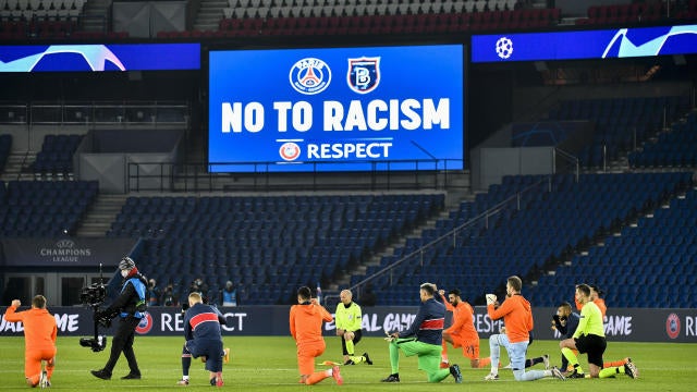 Psg Istanbul Basaksehir Players Kneel Together Before Ucl Match Resumes Cbssports Com