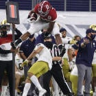 Alabama's Najee Harris hurdles Notre Dame defender after ...