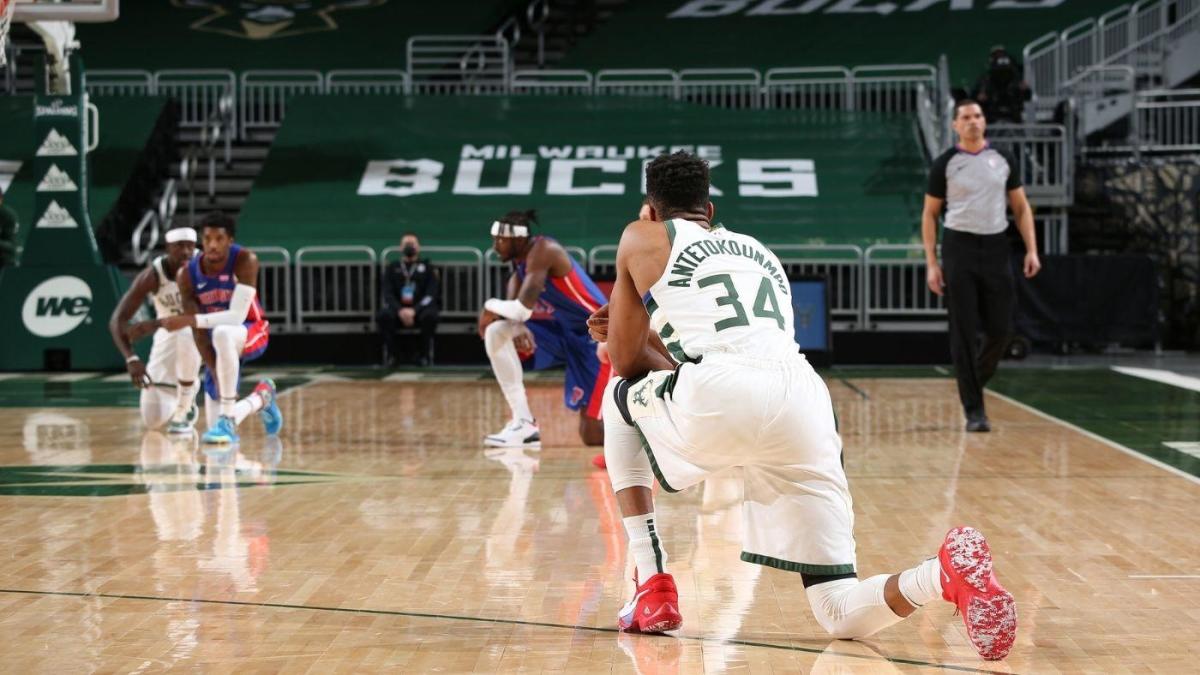 As NBA restarts, teams take a knee before games