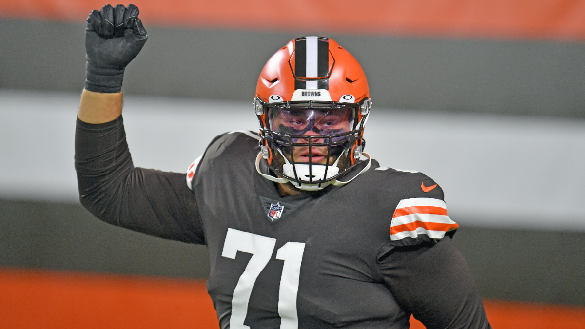 Cleveland Browns offensive tackle Jedrick Wills Jr. is helped off the field  after getting injured during the first half of an NFL divisional round  football game against the Kansas City Chiefs, Sunday