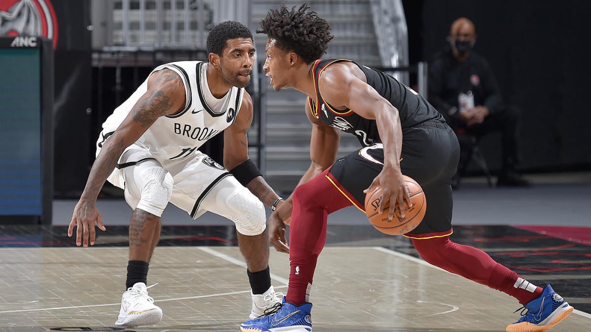 Kyrie Irving reacts to Collin Sexton wearing No. 2 with Cleveland Cavaliers