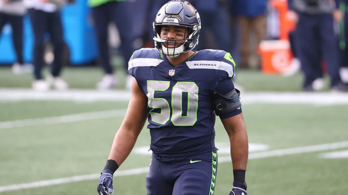 Seahawks star defender says Russell Wilson 'isn't going anywhere,' expects  QB to stay 'for a very long time' 