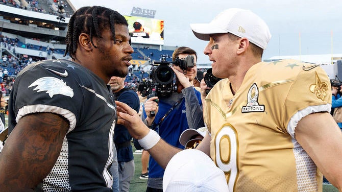 gettyimages-lamar-jackson-drew-brees.jpg