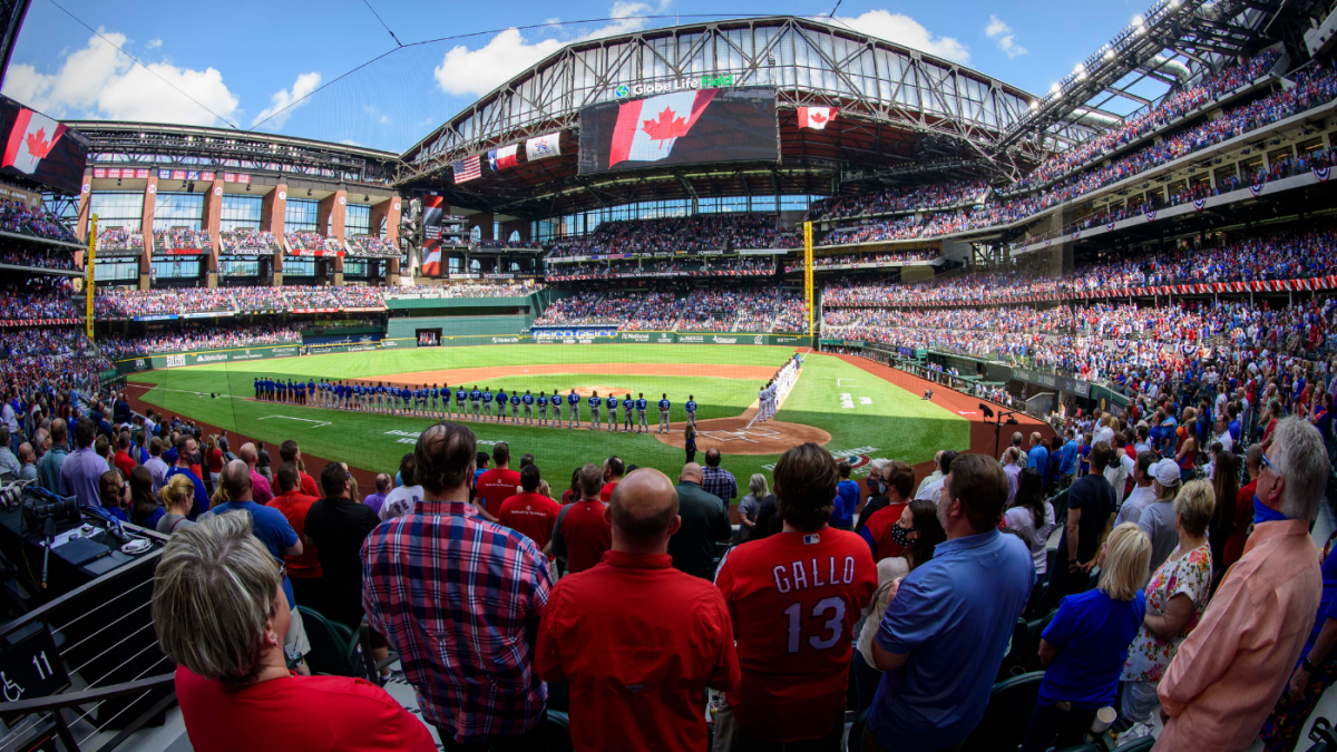 Texas Rangers play MLB home opener in front of packed stadium.