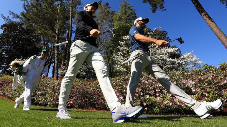 rory-mcilroy-dustin-johnson-tall-masters-2021-g.jpg