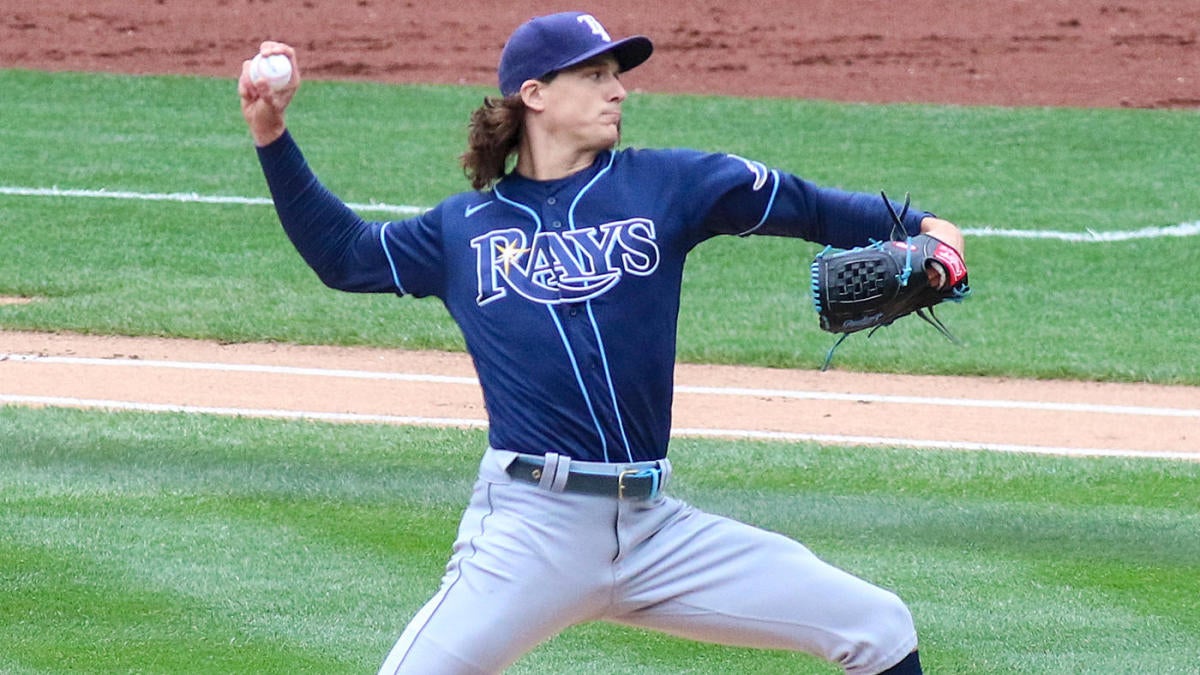 Tampa Bay Rays starting pitcher Tyler Glasnow wipes his face after