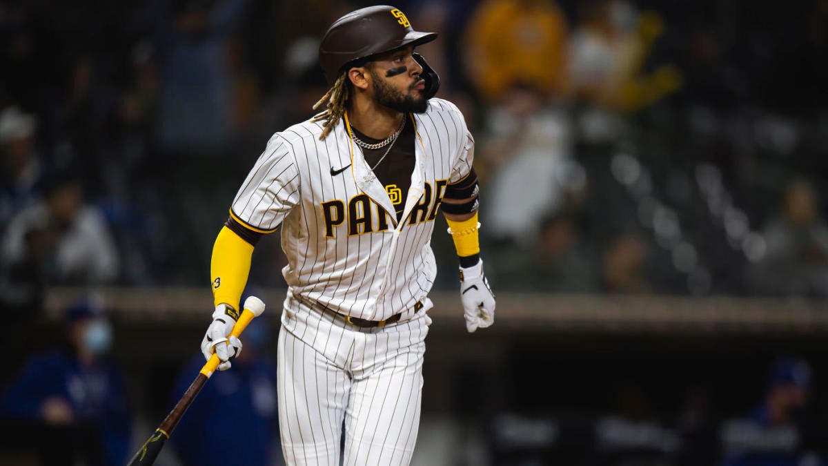 San Diego Padres shortstop Fernando Tatis Jr. holds his arm during the  eighth inning of a baseball game against the Los Angeles Dodgers Friday,  April 16, 2021, in San Diego. (AP Photo/Gregory