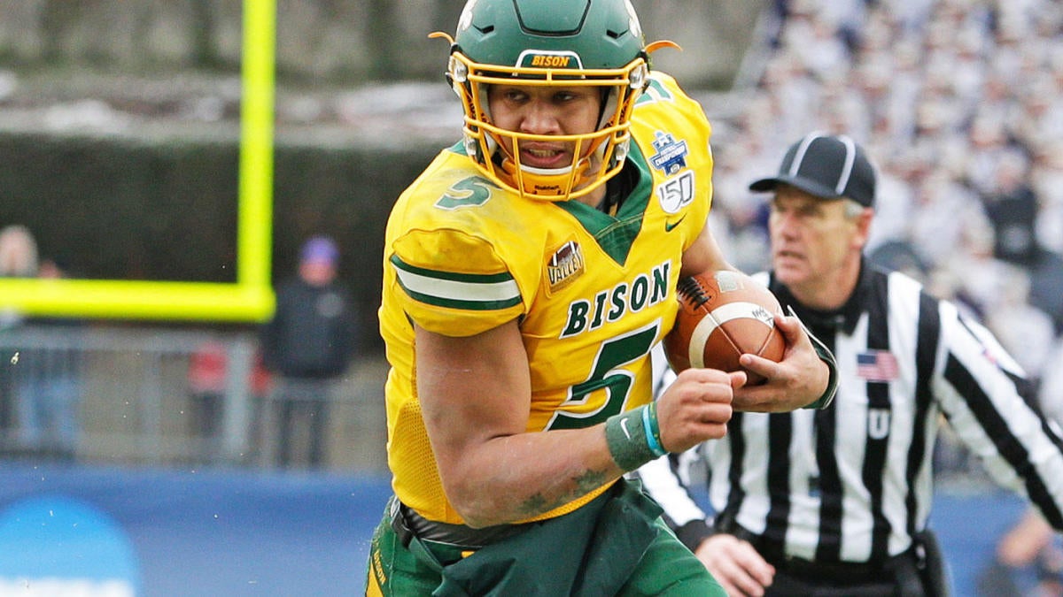 North Dakota State quarterback Carson Wentz holds his jersey after