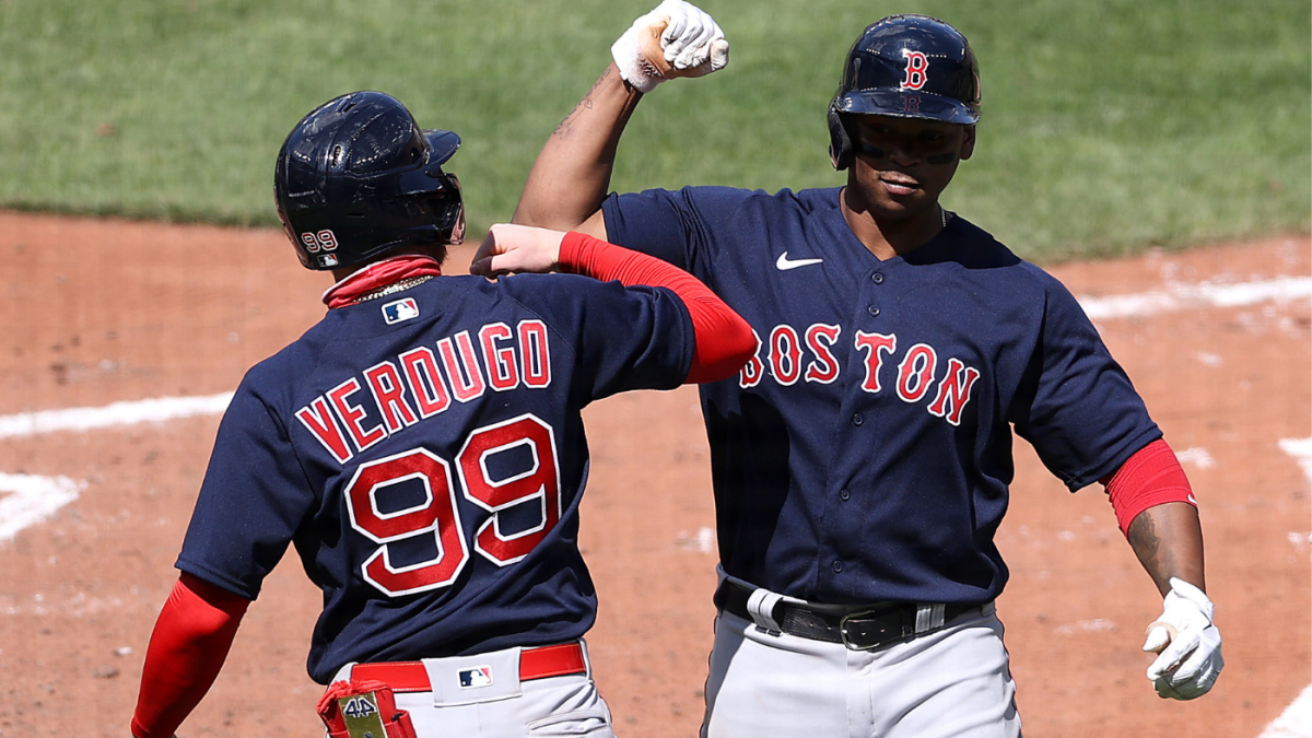 Boston Red Sox's Bobby Dalbec celebrates with Enrique Hernandez